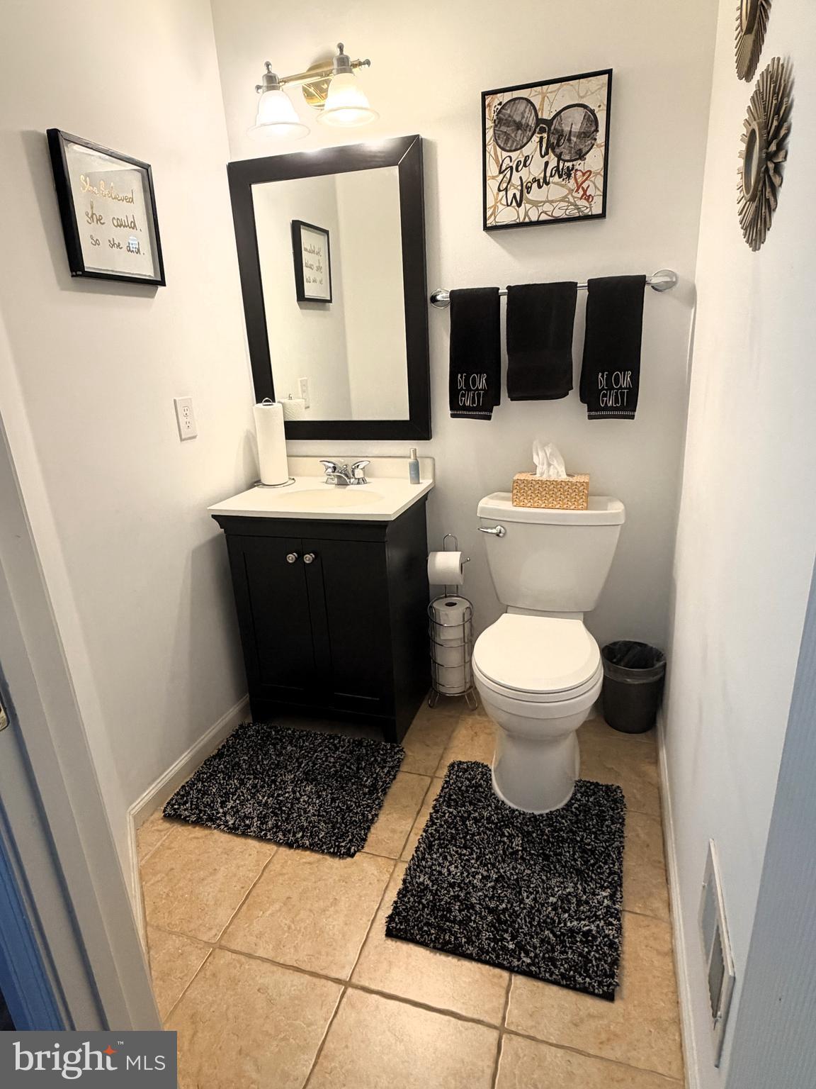 7088 Maiden Point Place, Unit 25 Elkridge, MD 21075 - Photo 4 of 29 a bathroom with a toilet and a shower