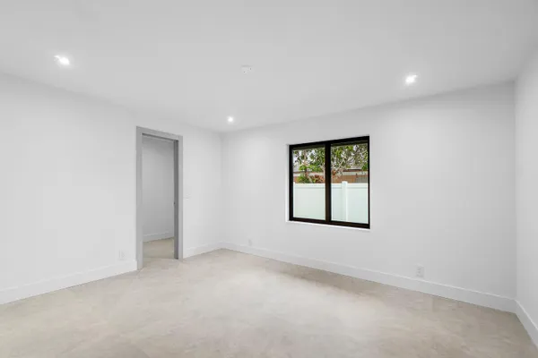 an empty room with windows