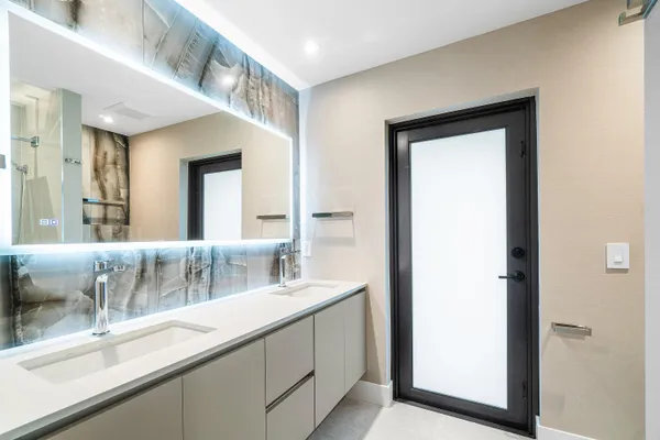 a bathroom with a shower and a toilet