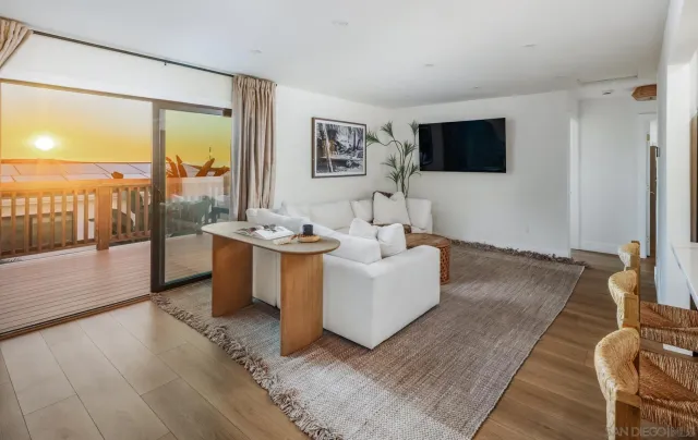 a balcony with hardwood floor