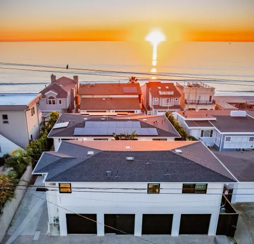 an aerial view of a ocean and city view
