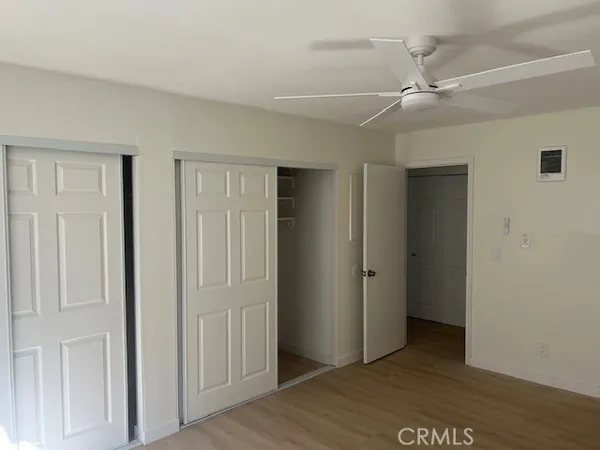 a view of a livingroom with a workspace