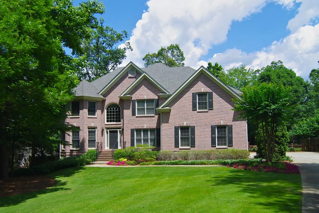 1511 Richard Stokes Drive Decatur, GA 30033 - Photo 1 of 1 a view of house with garden and tall trees