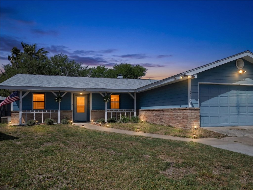 910 Twite Circle Corpus Christi, TX 78418 - Photo 1 of 39 a front view of a house with a yard
