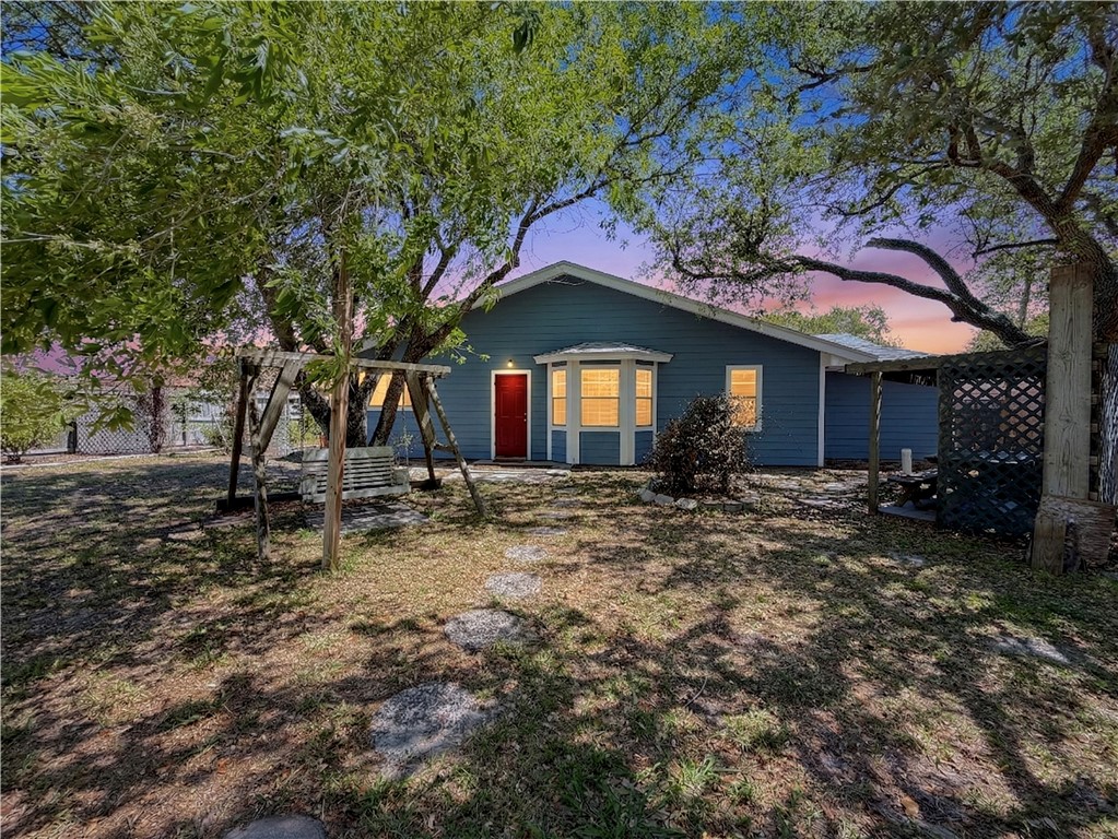 910 Twite Circle Corpus Christi, TX 78418 - Photo 2 of 39 a front view of a house with a yard