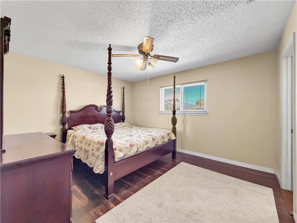 910 Twite Circle Corpus Christi, TX 78418 - Photo 23 of 39 a bedroom with a bed and window