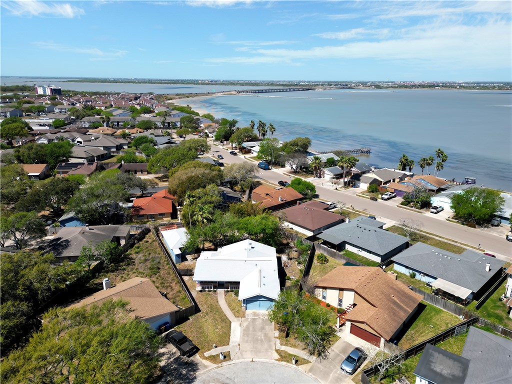 910 Twite Circle Corpus Christi, TX 78418 - Photo 3 of 39 an aerial view of a building with outdoor space and ocean view