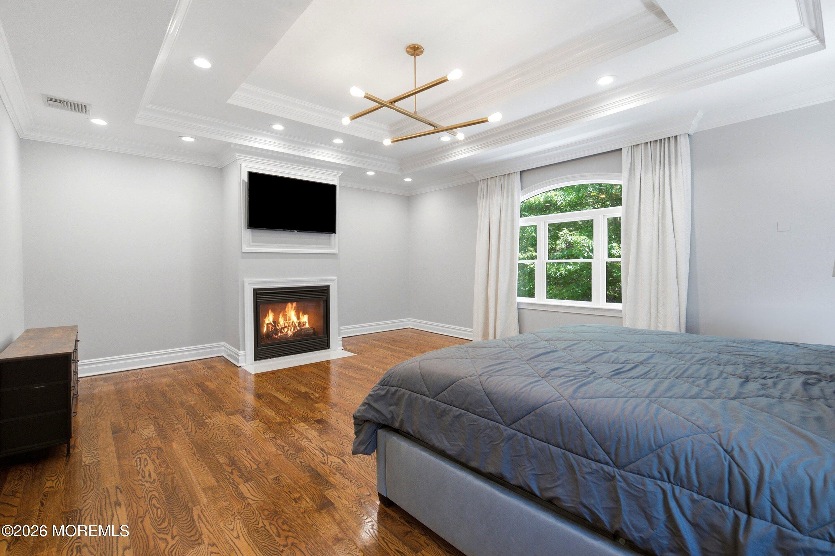 108 Heulitt Road Colts Neck, NJ 07722 - Photo 25 of 50 48-Primary Bed 2 with Fire