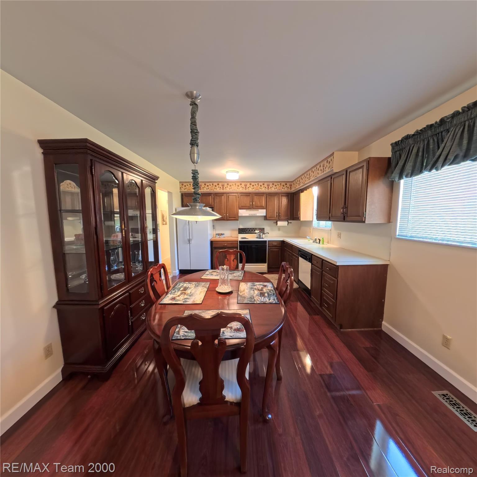2104 Whittier Road Ypsilanti, MI 48197 - Photo 27 of 45 Dining area featuring baseboards and dark wood-style floors