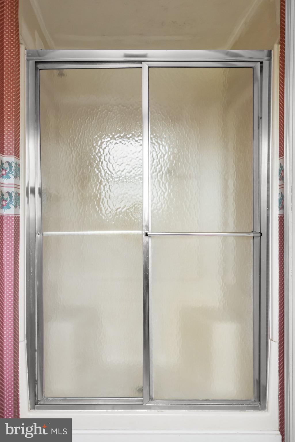 3 Quail Ridge Drive Bridgeton, NJ 08302 - Photo 25 of 34 a bathroom with a glass shower door
