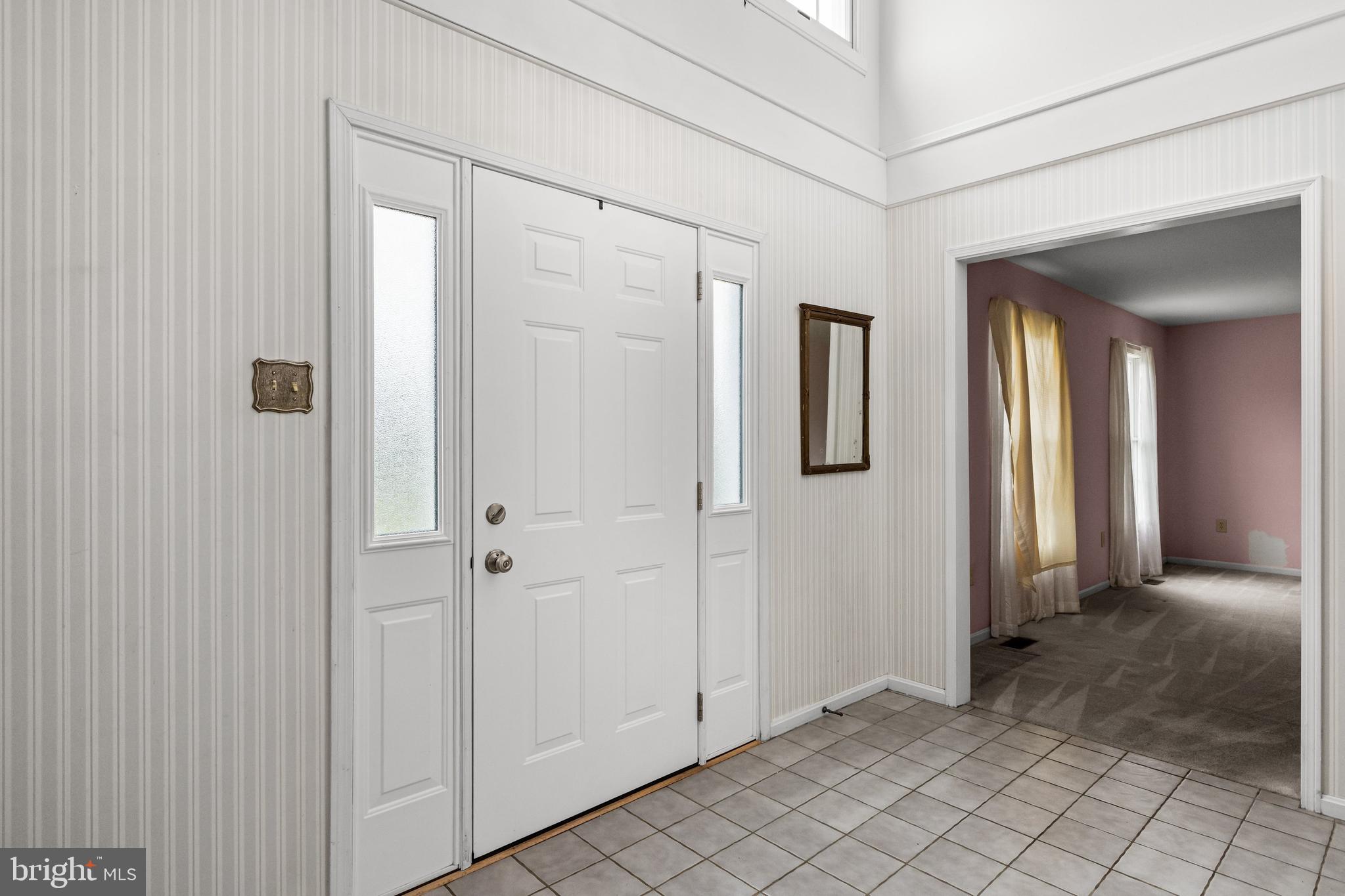 3 Quail Ridge Drive Bridgeton, NJ 08302 - Photo 5 of 34 a view of a hallway with wooden floor