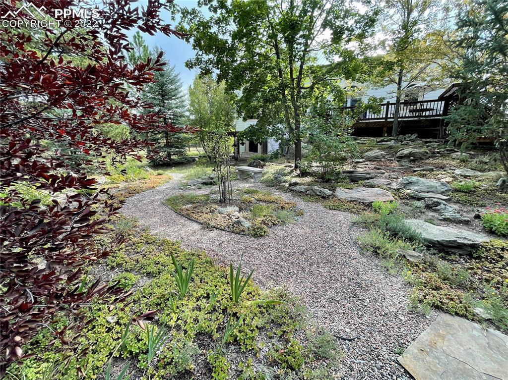 Undisclosed Address Elbert, CO 80106 - Photo 26 of 37 a view of backyard with outdoor seating and green space