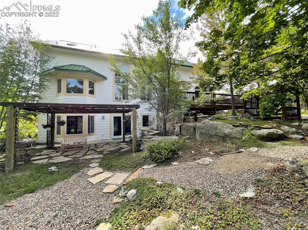 Undisclosed Address Elbert, CO 80106 - Photo 27 of 37 a front view of a house with a yard