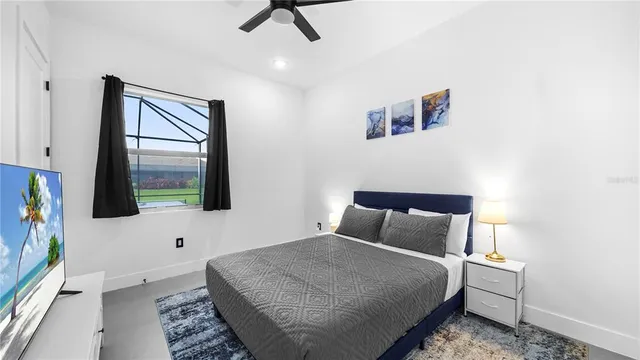 a bathroom with a double vanity sink a large mirror and shower
