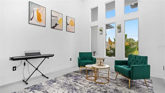 a living room with furniture and a window