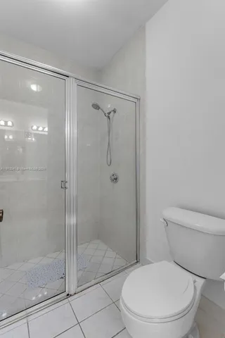 a living room with lots of furniture and white walls