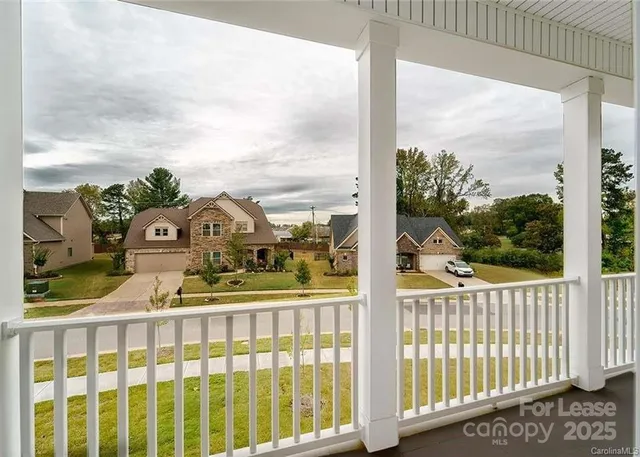 a view of a balcony with a garden