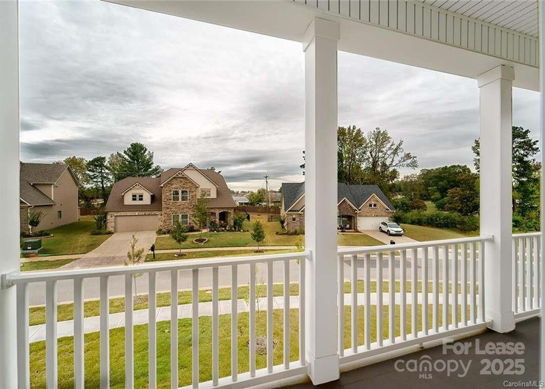 13012 Vermillion Crossing Court Huntersville, NC 28078 - Photo 12 of 18 a view of a balcony with a garden