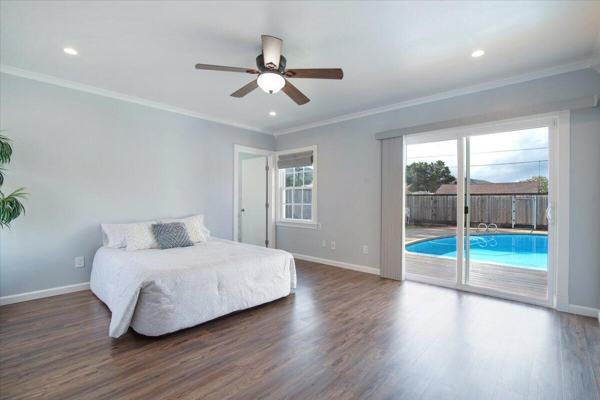 403 South M Street Lompoc, CA 93436 - Photo 14 of 32 a bedroom with a bed and a large window