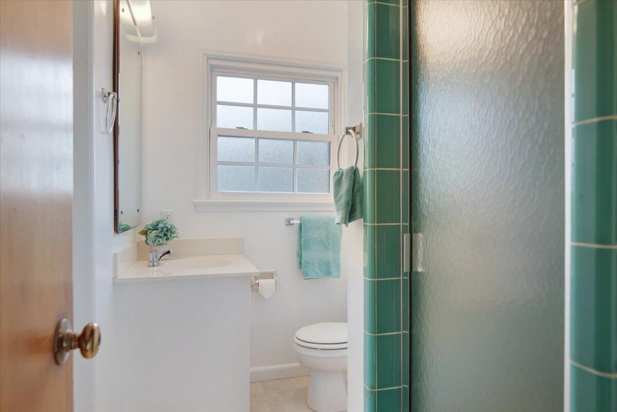 403 South M Street Lompoc, CA 93436 - Photo 23 of 32 a bathroom with a sink and toilet