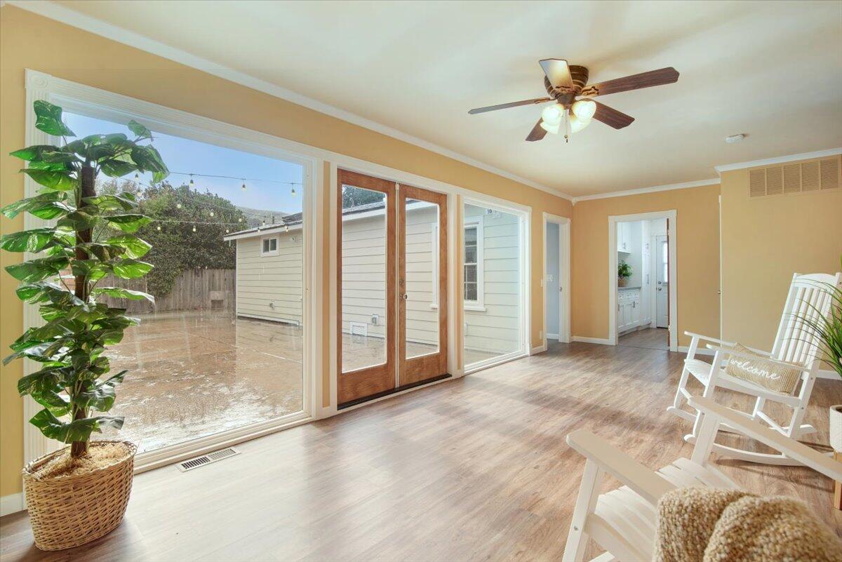 403 South M Street Lompoc, CA 93436 - Photo 27 of 32 a view of an empty room with a potted plant
