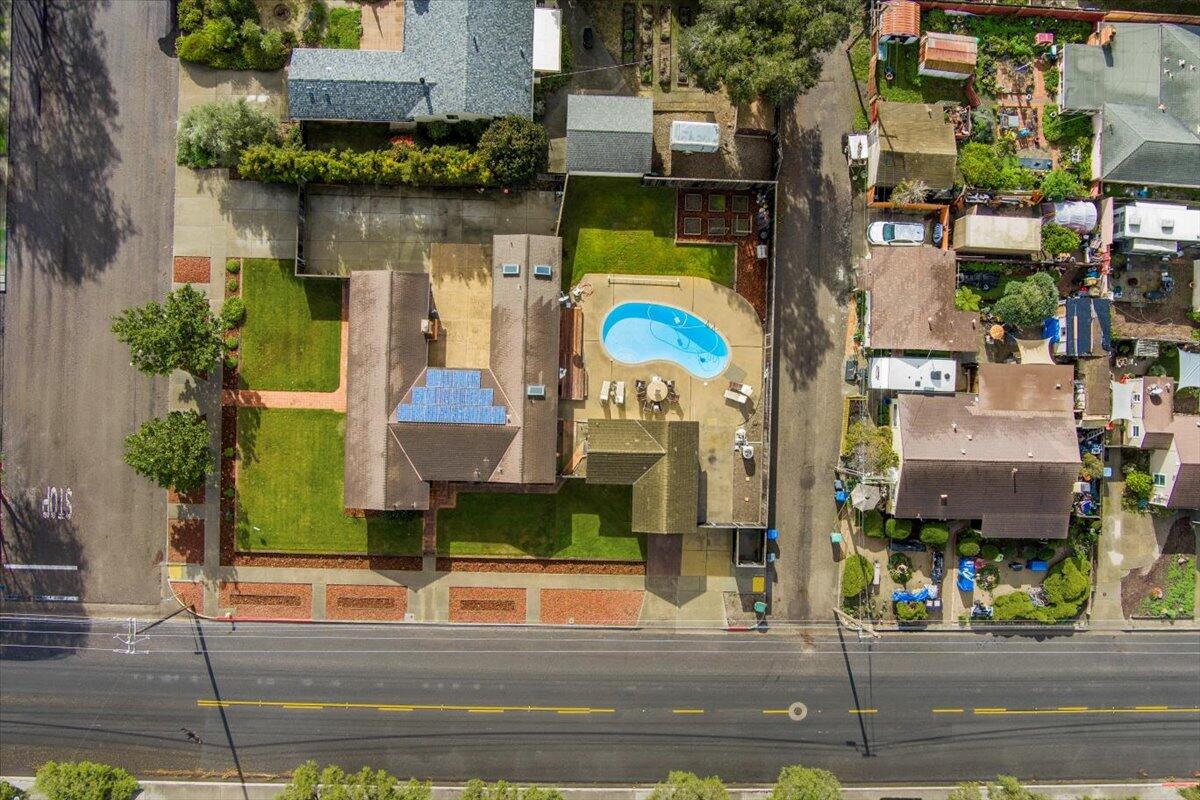 403 South M Street Lompoc, CA 93436 - Photo 30 of 32 an aerial view of a house with a swimming pool