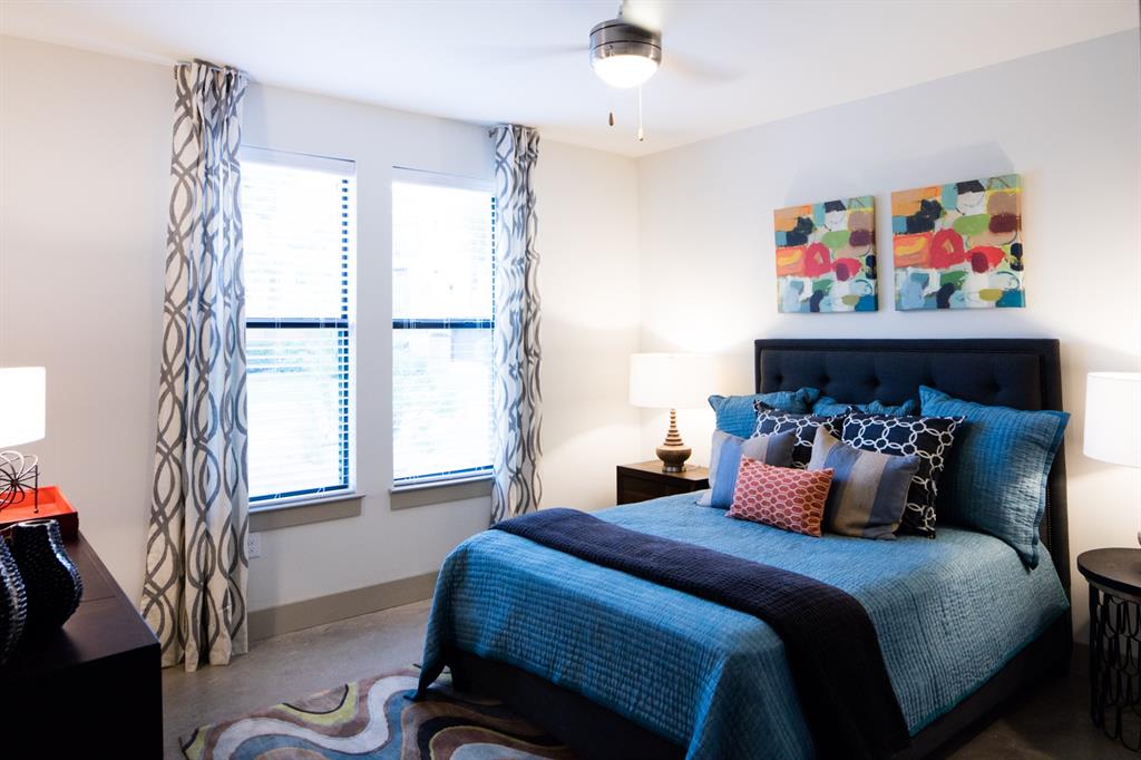 4020 Gilbert Avenue, Unit 101 Dallas, TX 75219 - Photo 8 of 8 a bedroom with bed and a window