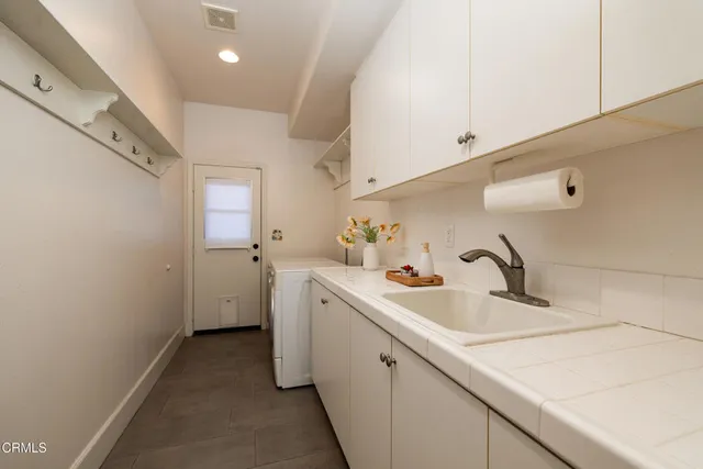 a front view of a house with swimming pool