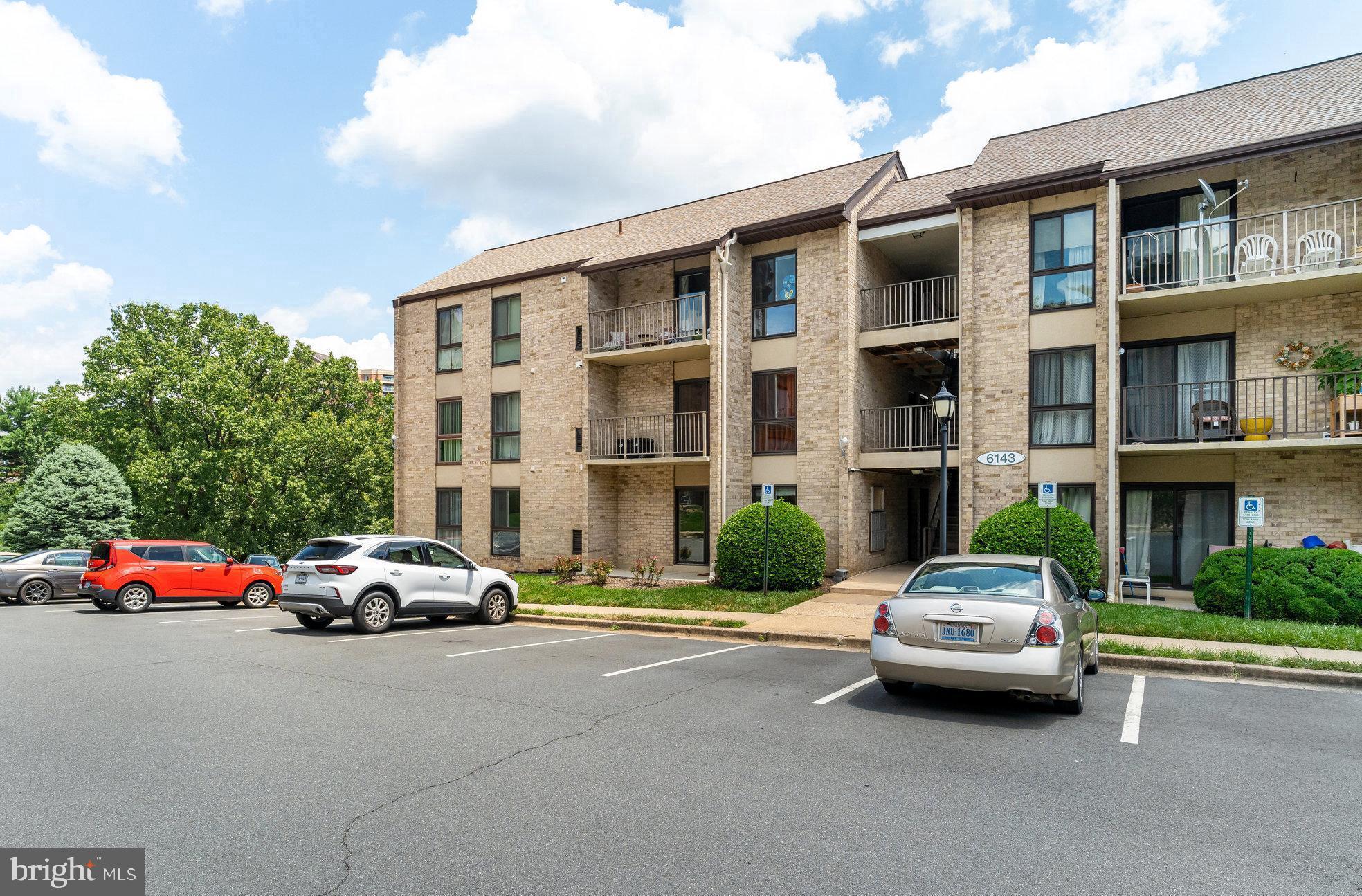 6143 Edsall Road, Unit J Alexandria, VA 22304 - Photo 19 of 23 a car parked in front of a building