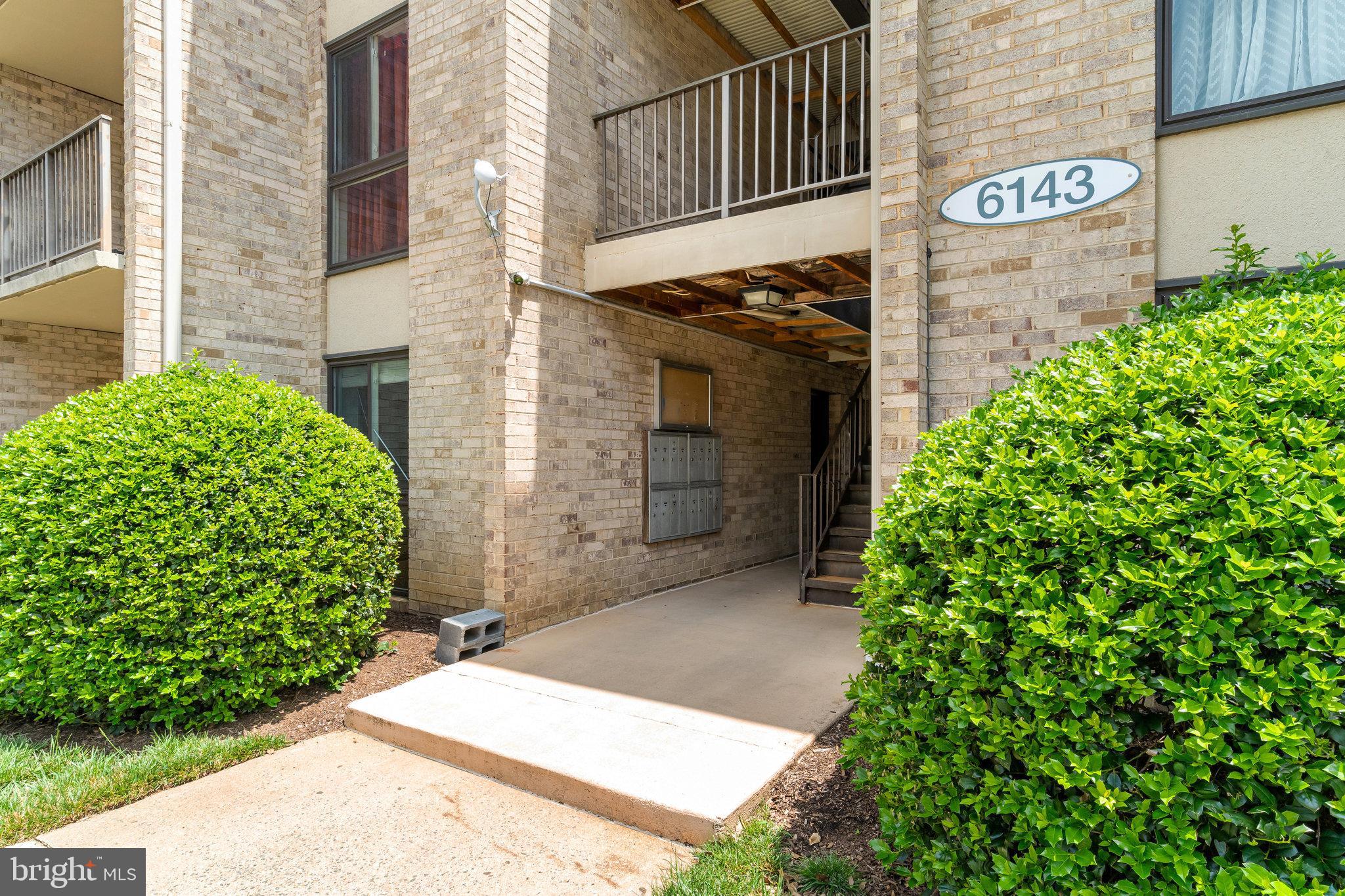 6143 Edsall Road, Unit J Alexandria, VA 22304 - Photo 21 of 23 a view of a street with potted plants