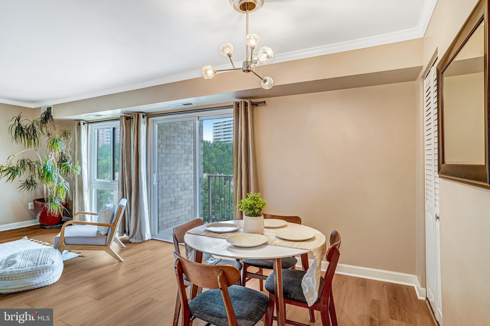 6143 Edsall Road, Unit J Alexandria, VA 22304 - Photo 5 of 23 a view of a dining room with furniture window and outside view
