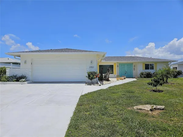 a view of backyard of a house