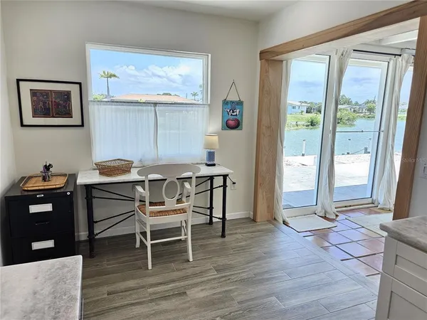 a workspace with furniture and window