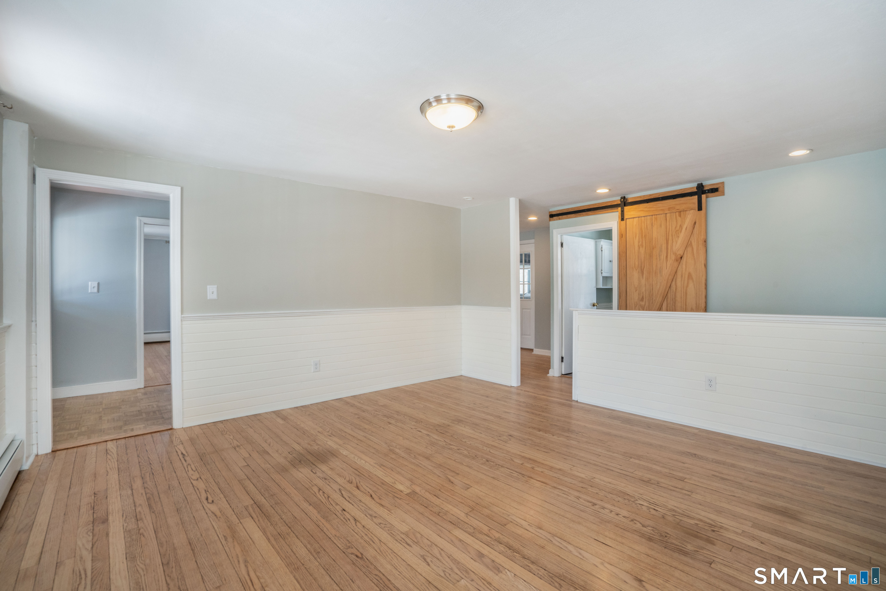 23 Keyes Street Farmington, CT 06085 - Photo 8 of 39 Large Family Room or Dining Room Area