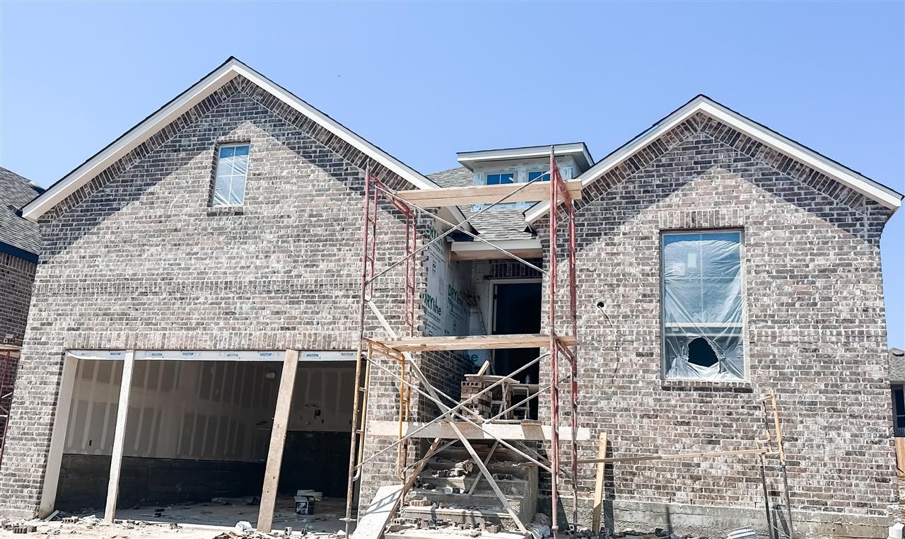a front view of a house with terrace
