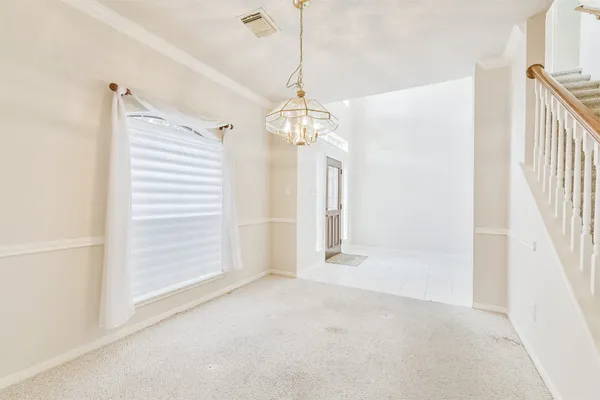 a very nice looking hallway with a window