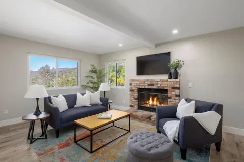a room with gym equipment and a flat screen tv