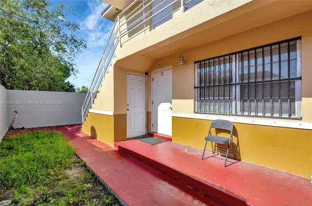 a view of a swimming pool with a chair