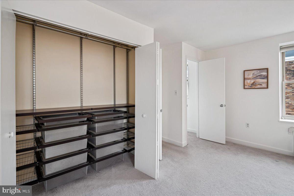 2440 16th Street Northwest, Unit 521 Washington, DC 20009 - Photo 18 of 35 a view of room with window and closet