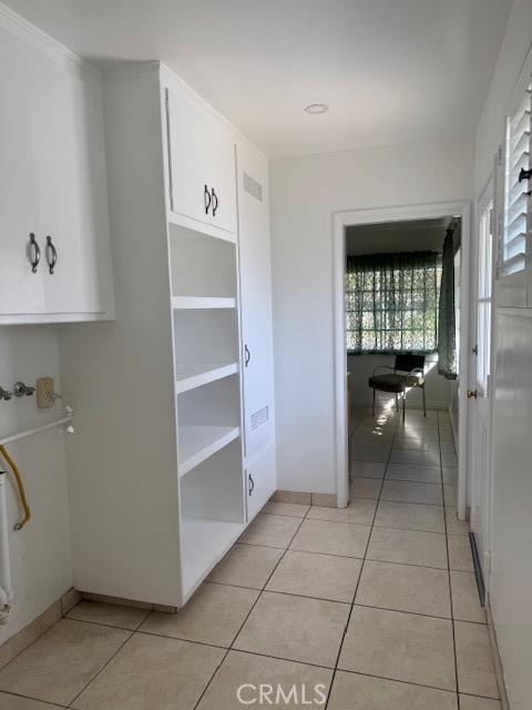 1200 West Rowan Street Anaheim, CA 92801 - Photo 15 of 20 a view of a hallway to an empty room with a window
