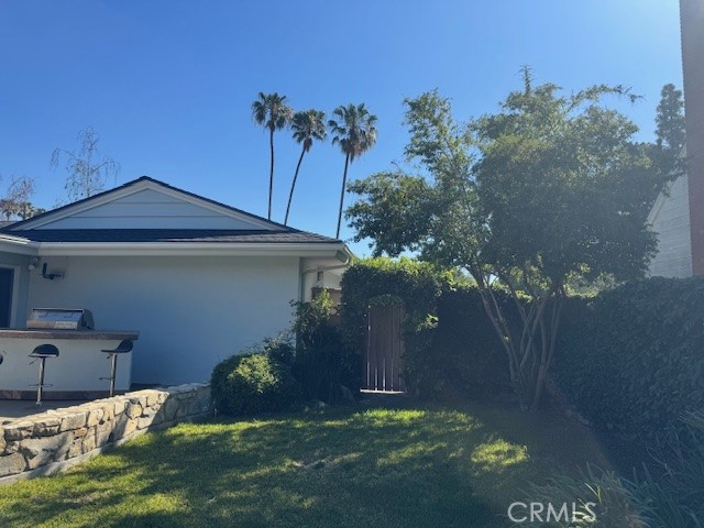1200 West Rowan Street Anaheim, CA 92801 - Photo 4 of 20 a view of a house with a yard