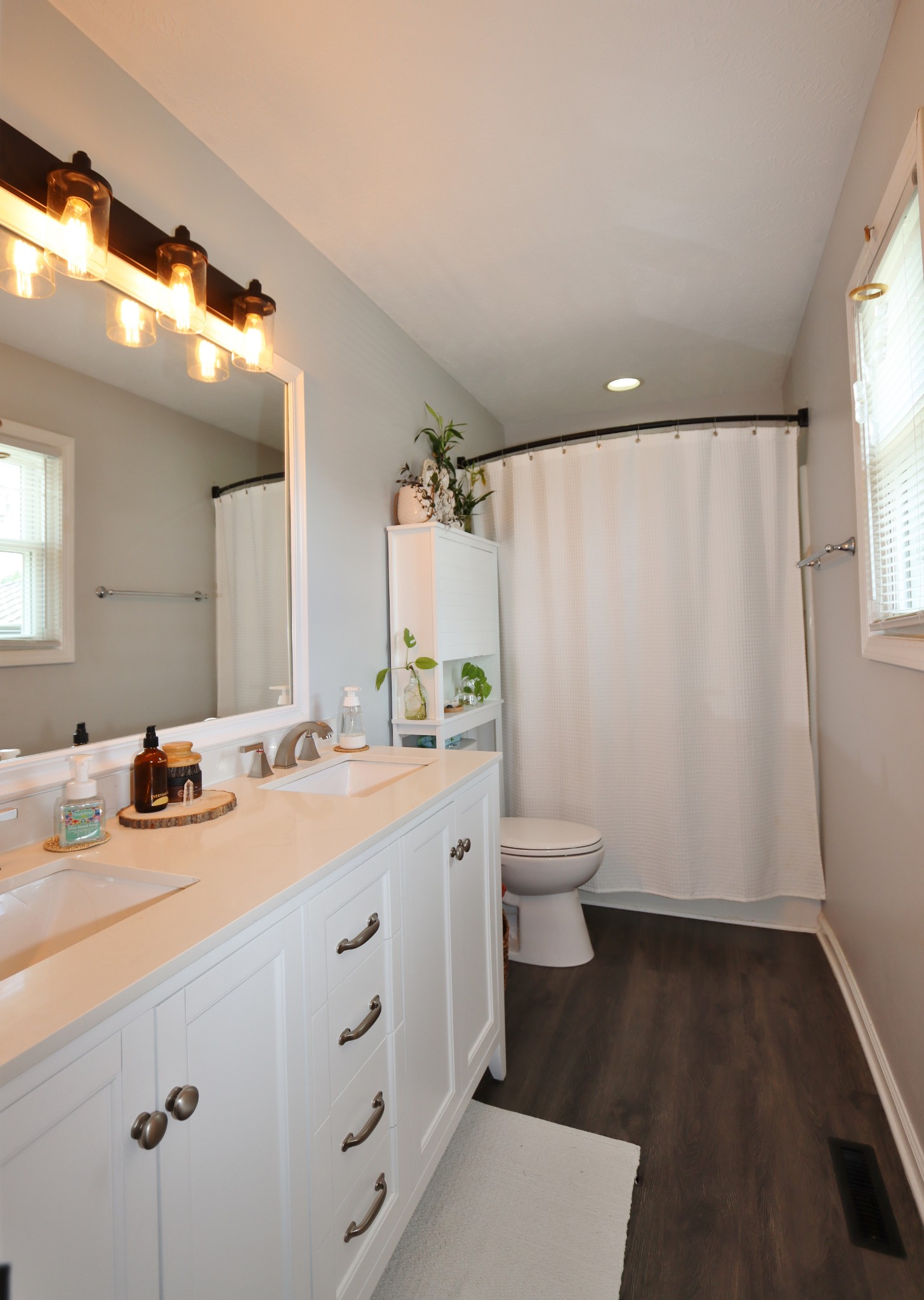 1621 Hickory Point Road Clarksville, TN 37043 - Photo 20 of 27 a view of bathroom with a sink toilet and a mirror