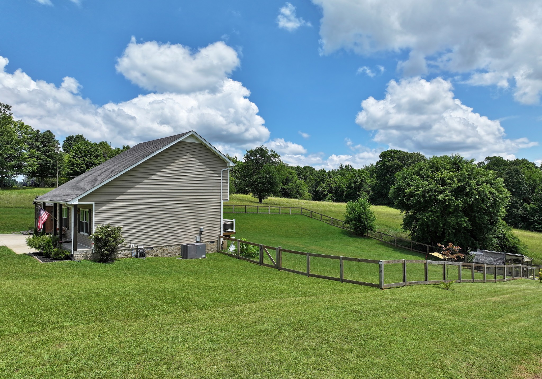 1621 Hickory Point Road Clarksville, TN 37043 - Photo 8 of 27 a view of a backyard with plants and a garden
