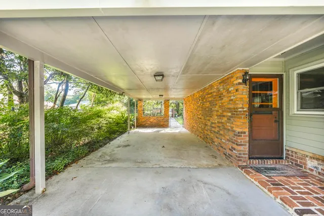 a view of entrance gate of a house