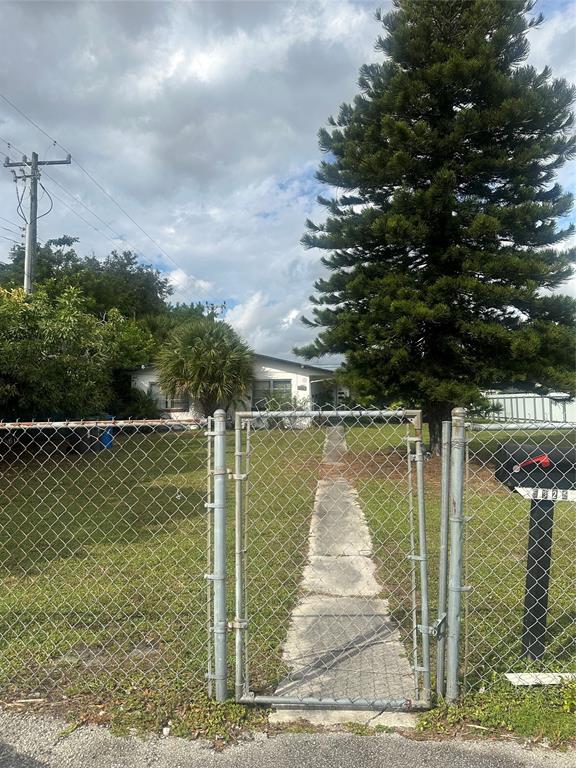 5925 Southwest 27th Street, Unit 1 West Park, FL 33023 - Photo 2 of 12 a lake view