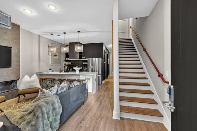 a kitchen with counter top space cabinets and a fireplace