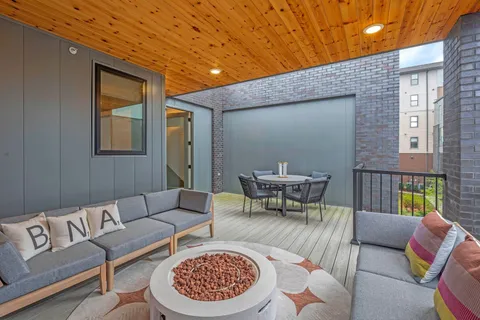 a outdoor living space with furniture and a couch