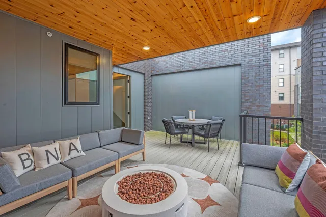 a outdoor living space with furniture and a couch