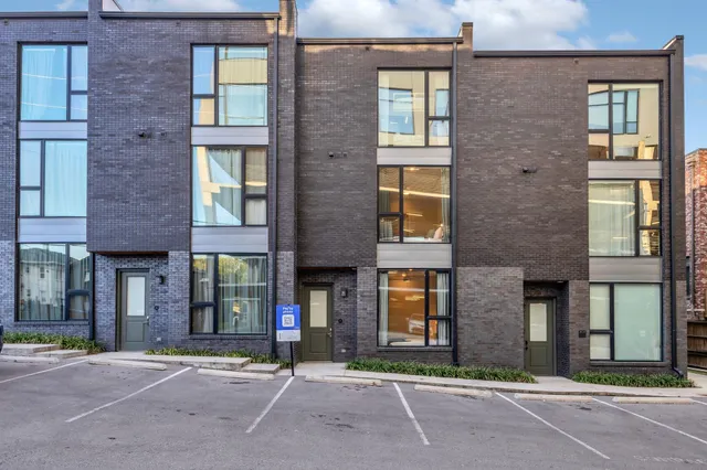 a front view of a retail shop and outdoor seating