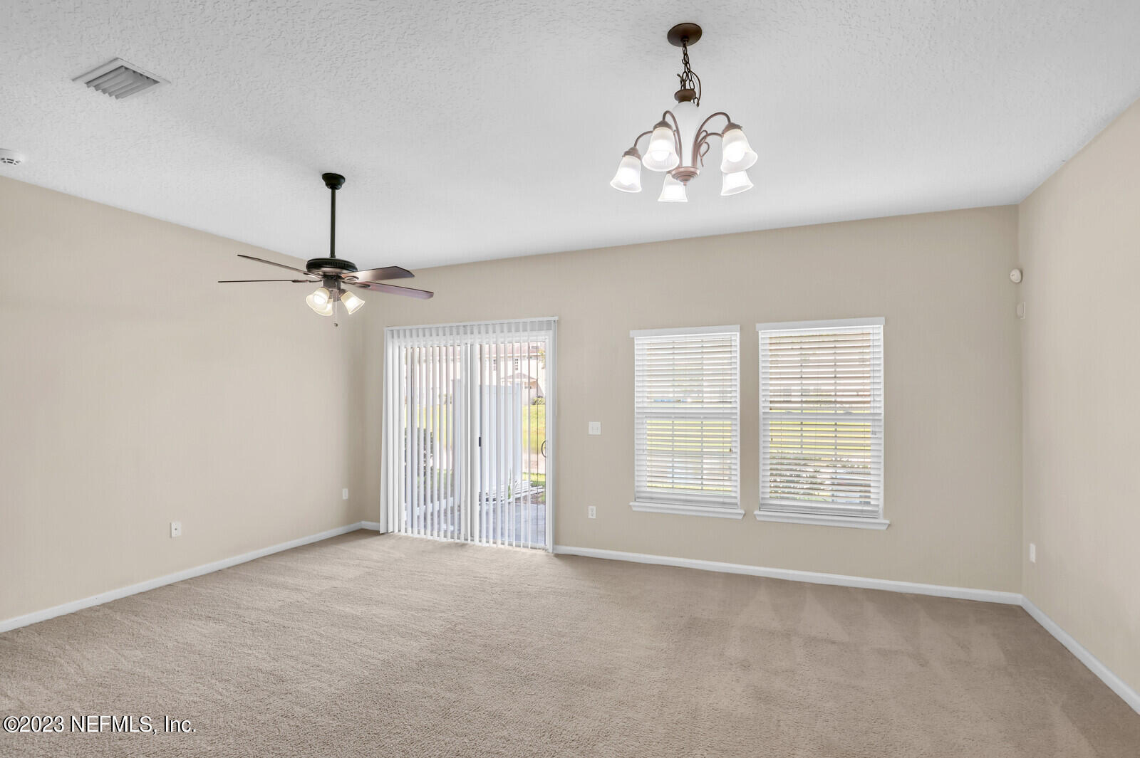 1810 Biscayne Bay Circle Jacksonville, FL 32218 - Photo 7 of 15 a view of an empty room with a window